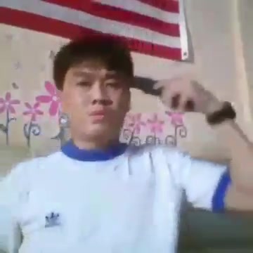 Asian man commits suicide by shooting him self in the head