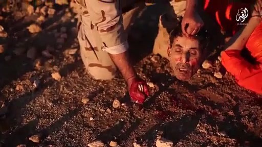 ISIS Bearded Beast Slaughtering Poor Prisoner 
