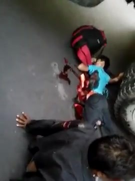 Indian woman  motorcycle accident