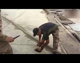 Iraqi Soldiers playing with ISIS decapitate head