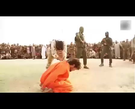 ISIS beheading imprisoned men