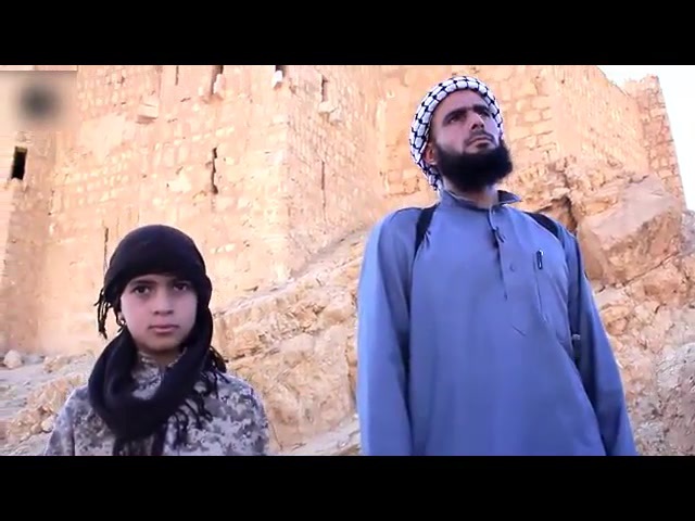 ISIS child militant beheading Syrian soldier