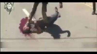 ISIS Fighter Brutally Stabs Man To Death