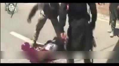 ISIS Fighter Brutally Stabs Man To Death