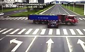 Car Runs Red Light and Slams into Truck