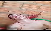 Young man gasping for air after being shot in the head