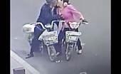 Two old Asian lovers on the road