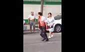 Chinese woman stabbing her husband in crowd