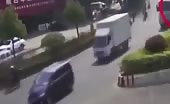 Car gets crushed between 2 cement trucks