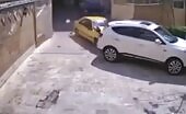 Driver murders walker while slamming through a door.