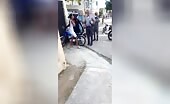 Lady battles with police