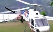 (repost) fellow strolls into helicopter rotor