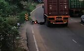 Pop!!! biker squashed by truck and his head in a real sense detonated