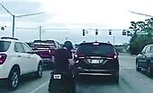 Motorcyclist squashed between two vehicles