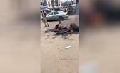 Individuals being scorched in the city's principle road