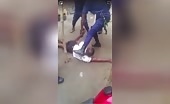 Man being beaten by police