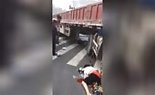 An ordinary day in china, lady squashed by truck.
