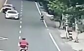 Enormous tree fall on chinese motorcyclist