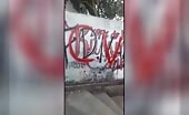 Certainly never perform doodles on a fucking wall in the rivalrous favela they