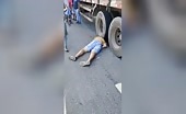 A male's head crushed due to the tires of a vehicle uncensored v.