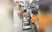 An employee stuck his head under a press at a factory uncenso