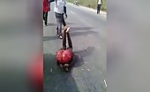 African motorbike robber managed crowd justice