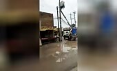 An electrician was electrocuted while working in the rain.
