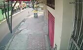 Hit man disguised as a garbage man implements his prey