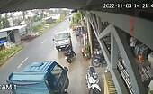 Like a puck in a goal motorcyclist soared under the tires of