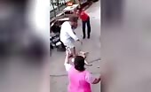 Male completely guard dogs own and also his doggie with a metal rod be actually