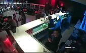 Several individuals batter a policeman in a club braz