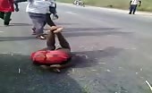 African Motorbike Thief Dealt With Mob Justice