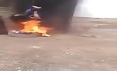 Shiite Soldiers Burns ISIS Member