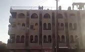 Man Thrown out of the building roof