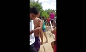 Chaotic Beating of Two Girls by Group of Women 