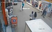 A woman strolling on the road was killed by a rock that fell o.