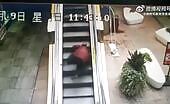 An elderly lady has fallen and can not get up the escalator