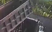 Dump truck bed falls on person