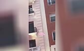 Woman jumps from building