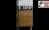 Teenager attempts suicide by jumping from a 50 foot high buildin