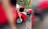 Car hits motorcycle