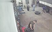 Tire store worker dies in accident
