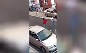 Two men brawl in the street in Philadelphia