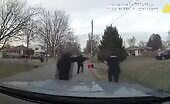 Woman shot after pointing weapon at officers