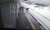 Teen jokingly boxing, lost his balance and falls under tr