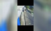 Biker Crashes Into Refuse Truck