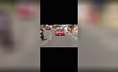 Biker Crashes Trying to Overtake Ferrari