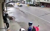 Biker Hit Crossing Road