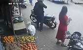 Car Crashes into Store, Hits People