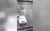 Car Rolls Towards Woman